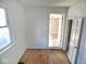 A bedroom with hardwood floors and good natural light through the window at 55 S 4Th Ave, Beech Grove, IN 46107
