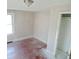 This bedroom has bare floors and a closet at 55 S 4Th Ave, Beech Grove, IN 46107