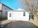 Detached garage with a door and two windows at 55 S 4Th Ave, Beech Grove, IN 46107