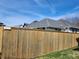 Tall wooden fence providing backyard privacy and security at 611 W South St, Shelbyville, IN 46176