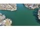Expansive aerial view of a lake surrounded by homes with docks, emphasizing the waterfront living at 6290 Grouse Dr, Nineveh, IN 46164