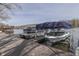 Private boat dock with multiple boats on a serene lake at 6290 Grouse Dr, Nineveh, IN 46164