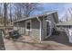 Outdoor deck with a dining area and an attractive exterior at 6290 Grouse Dr, Nineveh, IN 46164