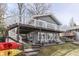 Charming home features a large deck with lake views, with stairs to access the yard at 6290 Grouse Dr, Nineveh, IN 46164