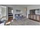 Inviting living room showcasing hardwood floors and a comfortable sofa, with views into adjacent rooms at 6290 Grouse Dr, Nineveh, IN 46164