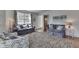 Bright and airy living room with hardwood floors and comfortable seating arrangement for relaxing and entertaining at 6290 Grouse Dr, Nineveh, IN 46164