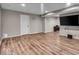 Open basement area with durable flooring, recessed lighting, and space for entertainment and relaxation at 6862 School Branch Dr, Brownsburg, IN 46112