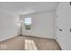 Carpeted bedroom featuring a floor lamp, a window, and a closet with a door at 6862 School Branch Dr, Brownsburg, IN 46112