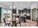 Spacious kitchen with island, stainless appliances, and sliding door to deck at 6862 School Branch Dr, Brownsburg, IN 46112