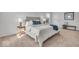 Cozy bedroom with soft carpet, neutral decor, and comfortable bedding at 6862 School Branch Dr, Brownsburg, IN 46112
