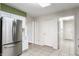 Clean, efficient kitchen layout with stainless steel fridge and lots of storage at 7616 Newport Bay E Dr, Indianapolis, IN 46240