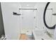 Bathroom with a shower, toilet, vanity, and an ornate mirror at 7733 Opelika Ct, Indianapolis, IN 46217