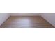 A bedroom with wood flooring and white walls at 7733 Opelika Ct, Indianapolis, IN 46217