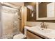 Stylish bathroom featuring glass-enclosed shower and modern vanity at 7859 N Chester Ave, Indianapolis, IN 46240