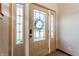 Front door with a decorative glass and a wreath, providing a warm welcome at 7859 N Chester Ave, Indianapolis, IN 46240