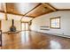 Spacious living room with wood floors and a cozy fireplace at 7859 N Chester Ave, Indianapolis, IN 46240