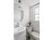 Bathroom featuring a white vanity and sink, patterned floors, and a toilet at 8020 N Meridian N St, Indianapolis, IN 46260