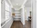 Bright walk-in closet features custom shelving and natural light at 8020 N Meridian N St, Indianapolis, IN 46260