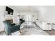 Spacious living room with a modern fireplace, French doors, and sophisticated decor at 8020 N Meridian N St, Indianapolis, IN 46260