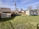 Spacious backyard featuring a shed, trampoline and grassy lawn for recreation at 810 Fabyan Rd, Indianapolis, IN 46217