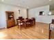 Dining room with wood floors, dining table and chairs and built in hutch at 810 Fabyan Rd, Indianapolis, IN 46217