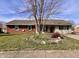 Charming single story house with brick and vinyl siding and flower bed at 810 Fabyan Rd, Indianapolis, IN 46217