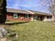 Charming single story house with brick and vinyl siding and well maintained front yard at 810 Fabyan Rd, Indianapolis, IN 46217