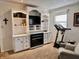 Inviting living room featuring custom built-ins, fireplace, and comfortable seating at 810 Fabyan Rd, Indianapolis, IN 46217