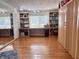 Spacious home office with built-in shelving, ample desk space, and natural light at 810 Fabyan Rd, Indianapolis, IN 46217