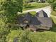 Aerial view of backyard with patio, fire pit, and playset at 859 E Bunkerhill Rd, Mooresville, IN 46158