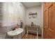 Charming bathroom features new flooring, sink, and a stylish farmhouse table at 859 E Bunkerhill Rd, Mooresville, IN 46158