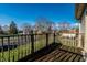Relax on this deck with a view of the open parking lot and neighborhood at 11931 E Welland St, Indianapolis, IN 46229