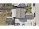 A bird's-eye view of the property showing roof, parking area, and surrounding neighborhood at 1231 S Pershing Ave, Indianapolis, IN 46221