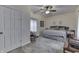 Bedroom with neutral colors, ceiling fan and carpet at 1231 S Pershing Ave, Indianapolis, IN 46221