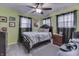 Bedroom featuring ceiling fan, natural light and neutral color scheme at 1231 S Pershing Ave, Indianapolis, IN 46221