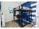 Nicely decorated bedroom featuring a lofted bed, desk, and shark-themed decor at 15524 Dusty Trl, Noblesville, IN 46060