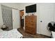 Bedroom showcasing a dresser and neutral decor at 15524 Dusty Trl, Noblesville, IN 46060