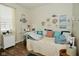 Bright, airy bedroom with daybed, white furniture, and charming coastal decor at 15524 Dusty Trl, Noblesville, IN 46060