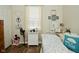Bright bedroom with wood floors, large window and nautical decor at 15524 Dusty Trl, Noblesville, IN 46060