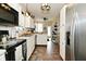 Bright kitchen with stainless steel appliances and an eat-in dining area at 15524 Dusty Trl, Noblesville, IN 46060