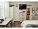 Bright main bedroom features wood floors, a desk, and an ensuite bathroom at 15524 Dusty Trl, Noblesville, IN 46060