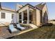 Large backyard with outdoor lounge chairs and covered patio, perfect for relaxation and entertaining at 15628 Allegro Dr, Westfield, IN 46074