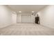 Finished basement space with a door, carpeted floors, and recessed lighting, ready for personalization at 15628 Allegro Dr, Westfield, IN 46074
