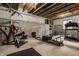 Unfinished basement with exposed beams, gym, and work out equipment. Ready for your personal touch at 15628 Allegro Dr, Westfield, IN 46074