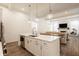 Open-concept kitchen with a large island, connecting seamlessly to the living room at 15628 Allegro Dr, Westfield, IN 46074