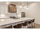 Gourmet kitchen with stainless steel appliances, a spacious quartz countertop island, and designer lighting at 15628 Allegro Dr, Westfield, IN 46074