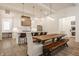 Spacious open-concept kitchen and dining area showcasing a large island, modern finishes, and ample natural light at 15628 Allegro Dr, Westfield, IN 46074
