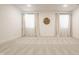 Large living room with natural light, neutral walls and carpet, and minimalist wall decor for a clean aesthetic at 15628 Allegro Dr, Westfield, IN 46074