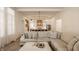 Spacious living room open to kitchen featuring comfortable seating and modern design at 15628 Allegro Dr, Westfield, IN 46074