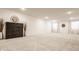 Spacious living room with soft carpet, neutral walls, and ample space for furniture arrangements at 15628 Allegro Dr, Westfield, IN 46074